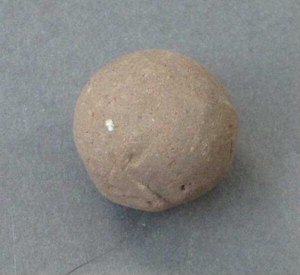 Clay ball or clay ball (?)