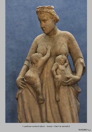 Die theologischen Tugenden : Caritas (vom Ostportal des Baptisteriums)