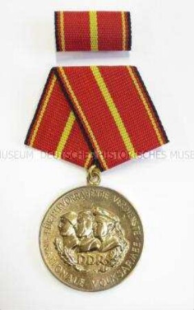 Verdienstmedaille der Nationalen Volksarmee in Gold, mit Interimsspange und Etui