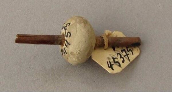 Spindle with clay whorl