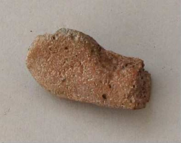 Fragment of a clay vessel