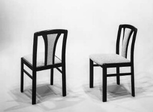 Stuhl mit gepolsterter Sitzfläche und Rückenlehne