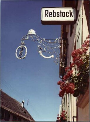 Wirtshausschild des Rebstock