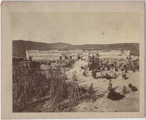 Entrance to the columned palace before complete excavation (with members of the expedition)