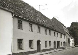 Belgern, Kirchstraße 7. Wohnhaus mit Laden, Ackerbürgerhaus (1824). Straßenansicht