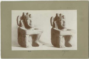 Sitzende Steinfigur. Original und Abguß.