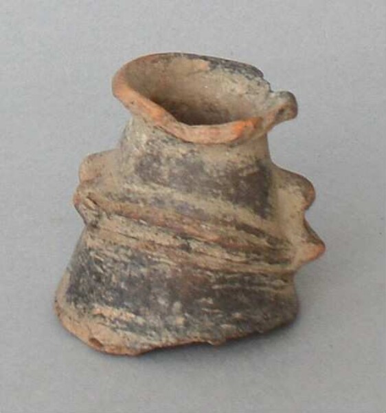 Fragment of a clay vessel