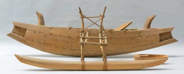 Model of an outrigger boat with accessories