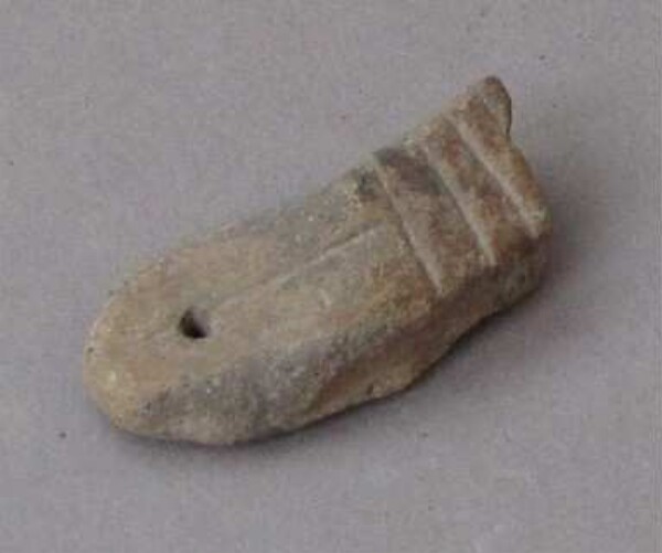 Figurine en argile (fragment)