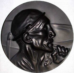 Kohlekeramikplakette "Tête de mineur" von C. Meunier