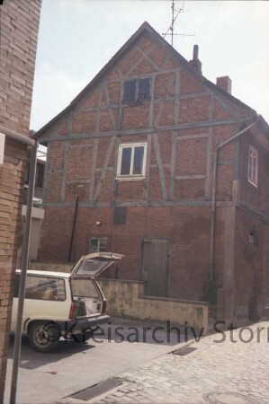 Mühlenplatz 3a: ehemaliger Futtermittelspeicher: Giebelseite mit Fachwerk