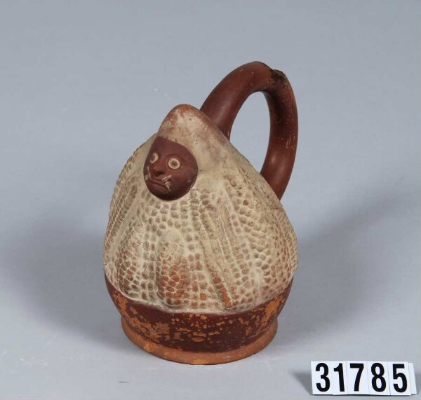 Vessel in the shape of a corn creature with fork neck spout