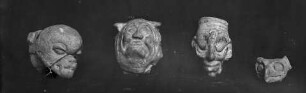 kleine Kopfplastiken menschlicher und tierischer Gestalt
