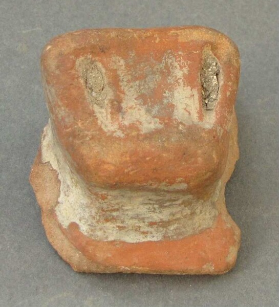 Fragment of a clay vessel