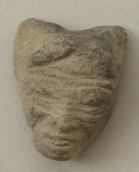 Fragment of a clay vessel