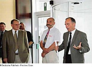 Begrüßungsansprache von Ulrich Prasser (Hotel Mercure Newa), daneben Matthias Griebel (Stadtmuseum) und Prof. Jürgen Hering (SLUB)