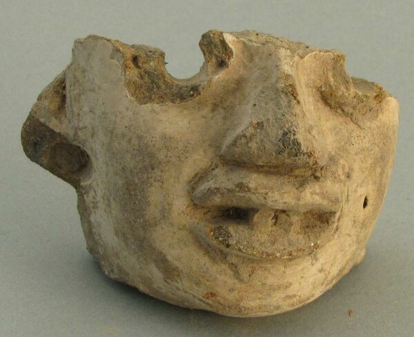 Clay head (fragment)