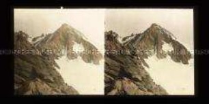 Bergsteiger mit Blick auf Glockner und Glocknerwand