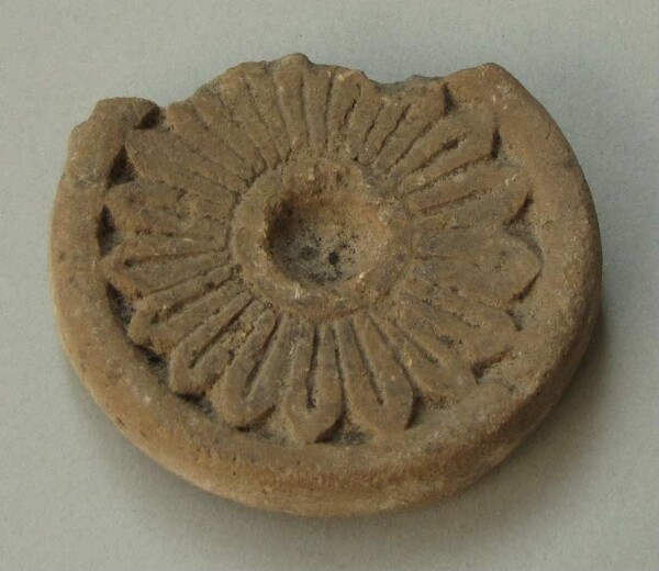 Handle of a clay vessel (fragment)