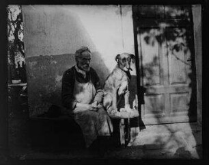 Ohne Titel (Johann Traugott Zille im Arbeitskittel mit Hund)