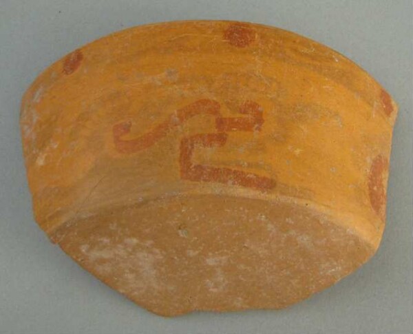 Fragment of a clay vessel