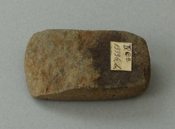 Stone axe blade (fragment)