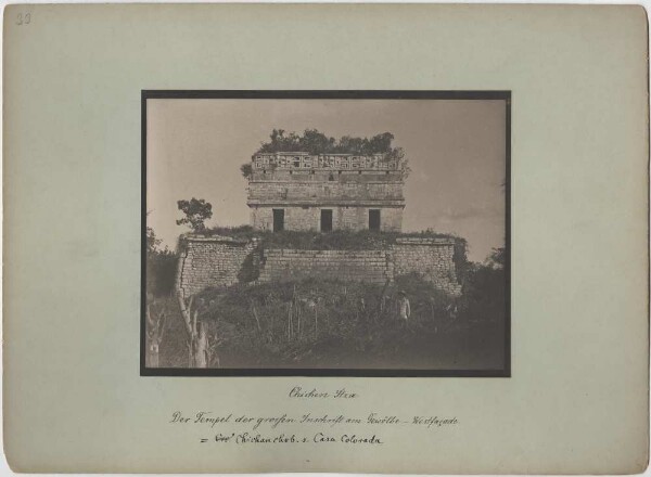 "Casa Colorada. West façade. (With expedition member.) The temple of the great inscription on the vault. West façade"