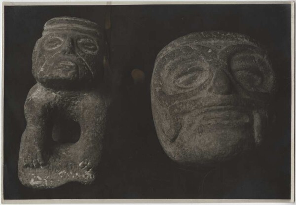 Clay head and stone figure