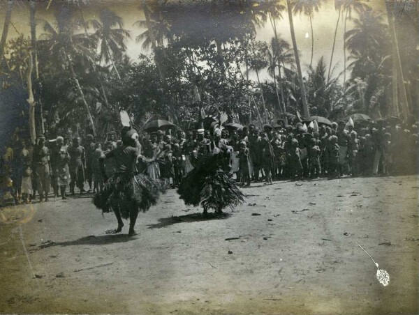 "Dancers with helmet masks. Jofin"