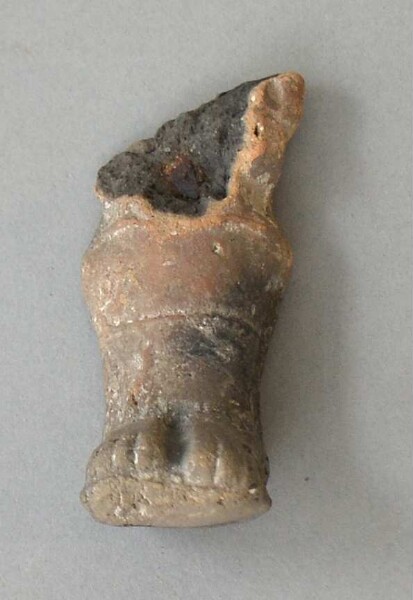 Foot of a clay figure