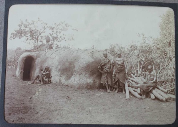 Masai women in front of hut