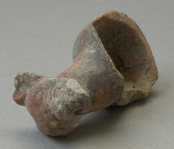 Fragment of a clay rattle (animal head)