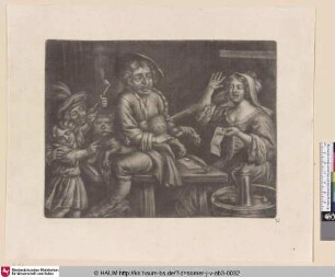 [Mann sitzt auf einem Tisch und hält eine Katze; Man seated at a table Holding a cat in his lap]