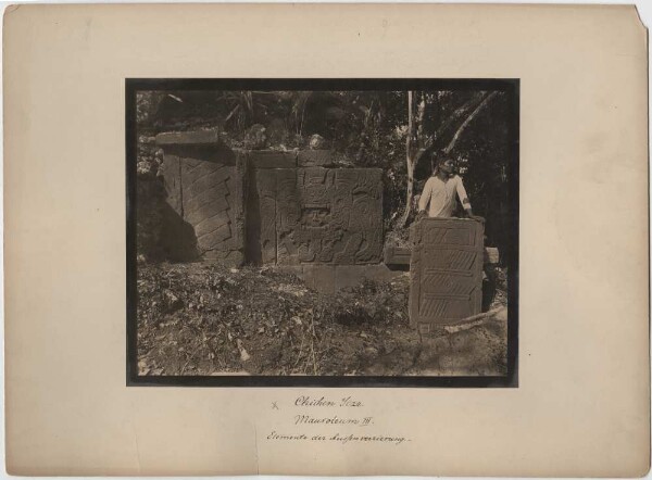 "Elements of the exterior decoration of Mausoleum III (with expedition member)."