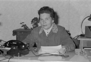 [Portrait am Arbeitsplatz]