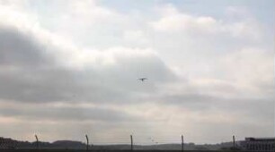 Flight experiment for laser communication between aircraft and ground