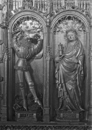Kreuzigungsaltar — Linker Altarflügel: Verkündigung und Heimsuchung — Die Heiligen Georg und Magdalena