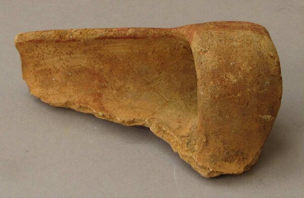 Fragment of a clay vessel