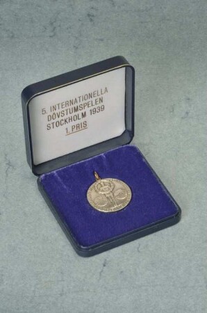 Medaille der 5. Internationalen Gehörlosenspiele