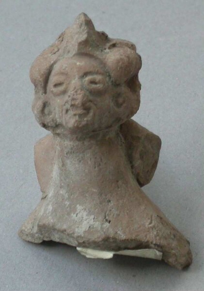 Fragment of a clay rattle (clay head)