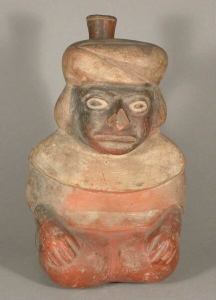 Seated anthropomorphic figure