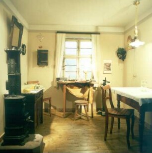 Pforzheim. Technisches Museum der Pforzheimer Schmuck-und Uhrenindustrie. Blick in Goldschmiedewerkstatt eines Heimarbeiters