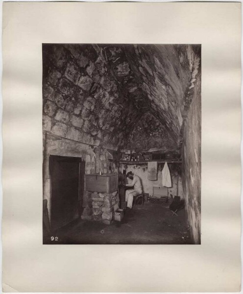 Workplace of an expedition member in a vaulted room (interior of a temple)