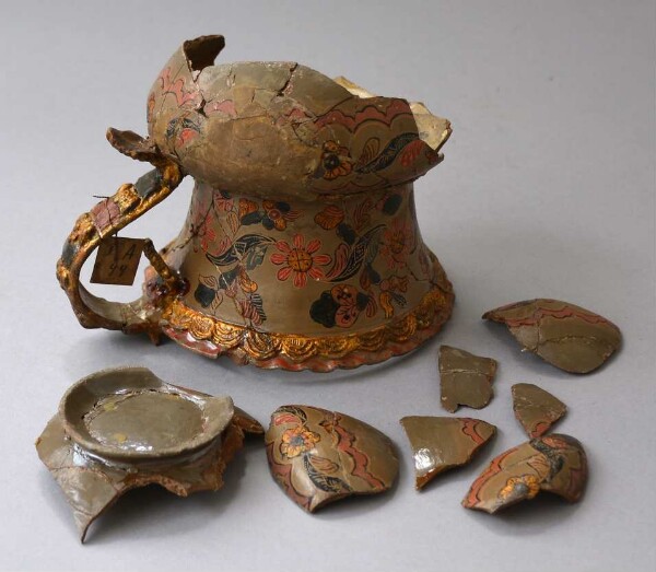 Fragments of a clay vessel for mate