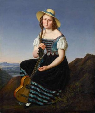 Mädchen mit Gitarre in der Landschaft