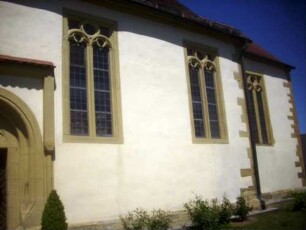 Evangelische Pfarrkirche-Langhaus über Traufseite Süd und Rechteckchor von Südwesten (jeweils romanische Gründung - im 17 Jh erhöht und Emporeneinbau)