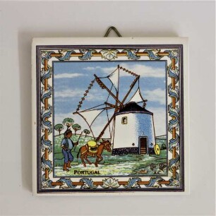 Segelwindmühle mit Mann und Esel