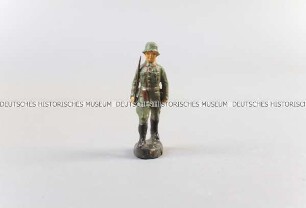 Massefigur: Soldat, marschierend, mit Säbel