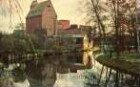 Pferdemarkt: Trave und Stadtarm, dahinter Firma Ströh