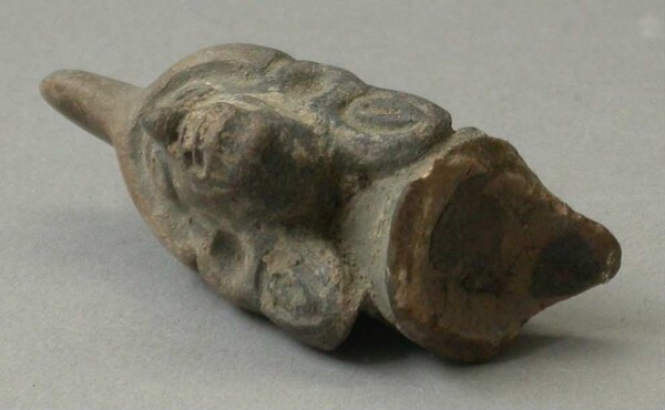 Fragment of a clay rattle (clay head)